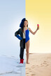 © master1305 - Winter vs. summer. Girl dressed inn winter coat on one side and swimsuit on another, standing between snowy landscape and desert, holding ice cream in hand. Concept of holiday, vacation, travelling