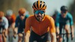 © sunchai - A competitive cyclist leads a group, showcasing speed and determination during a road race under clear skies.