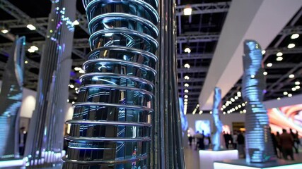 Aufkleber - Futuristic holographic towers illuminate a modern exhibition space filled with visitors