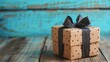 © COK House - Stylish gift wrapping with black polka dot ribbon on wooden background. Suitable for blogs about design, interiors and gifts.