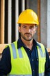 © haiqiang - arafed construction worker in a hard hat and safety vest