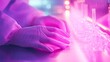 © StasySin - A person wearing a white lab coat and gloves is working on a table with a pink background. The table is filled with various scientific instruments and equipment, including a beaker and a test tube