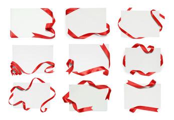 Wall Mural - Blank cards with red ribbon isolated on white, top view