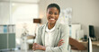 © peopleimages.com - Portrait, happy and a business black woman arms crossed in a corporate office as a professional. Management, suit and smile with a confident employee in her workplace with a mindset on company growth