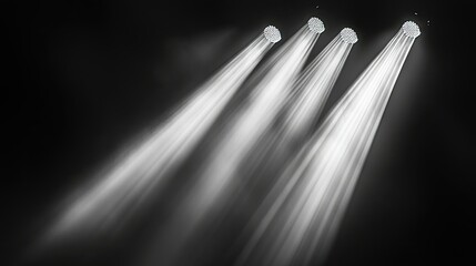 Wall Mural - Multiple spotlights cut through the darkness, casting intersecting beams of light.