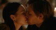 © gn8 - Young caucasian couple sharing a romantic moment in intimate candlelit setting