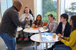 © Caia Image - Group of disabled people at photography class
