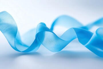 Wall Mural - elegant light blue ribbon swirling on white background, creating a sense of fluidity and grace