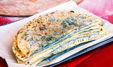 Traditional azerbaijani cuisine flat bread with herbs and meat. Azerbaijan national cuisine kutab or qutab