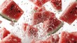 © Keattipoom - Fresh Watermelon Pieces Splashing in Droplets Against a White Background for Summer Refreshment Concept
