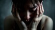 © Alexandr - Woman with hands on her face, expressing deep emotional distress