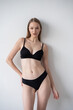 © alipko - Casting snapshot of a fresh-faced model in simple black underwear, highlighting her natural features, body proportions, and confident stance. Ideal for agency scouting and professional portfolio updat