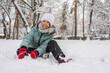 © ADDICTIVE STOCK - Smiling Child Enjoying Snowy Winter Day Outdoors in Forest