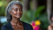 © kvladimirv - Serene Mature Woman with Gray Hair in Nature Setting, Embracing Tranquility and Confidence