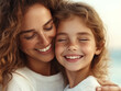 © Bohdan - Smiling mother and daughter share a joyful moment