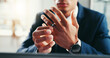 © peopleimages.com - Wedding ring, hands and businessman in office for divorce with infidelity, breakup or toxic relationship. Mistake, anxiety and male person with marriage band for separation of commitment in workplace