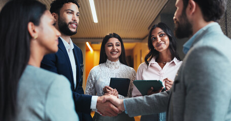 Poster - Group, business people and shaking hands in office for agreement, b2b partnership and meeting. Handshake, smile and team introduction, welcome and hello at seminar hallway in hotel lobby at night