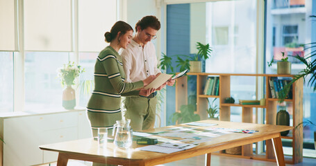 Poster - Design, documents and tablet with editor team in creative workplace for discussion or planning. Collaboration, conversation or magazine with business man and woman in office boardroom for publishing