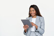© insta_photos - Happy busy African American business woman leader in suit standing isolated on white using digital tablet. Smiling businesswoman professional executive manager looking at pad computer holding tab.