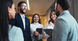 © peopleimages.com - Discussion, happy or business people in lobby for project, schedule update or conference hall advice. Staff, teamwork or keynote speaker with smile in meeting for networking, seminar or event review