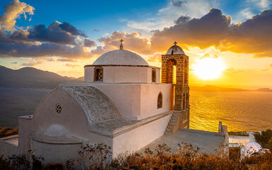 Wall Mural - One of the cozy streets of Plaka town. Milos island, Greece