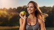© gankevstock - Fit woman enjoying healthy lifestyle with green apple