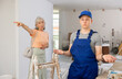 © JackF - Young builder is dissatisfied with the money received from an elderly woman for apartment renovation