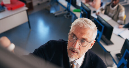 Poster - University, lecturer and man in classroom, above and share information with professor. Mature person, employee and worker with college, presentation and education with curriculum, seminar or learning