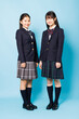 © Paylessimages - 高校の制服を着たアジアのティーンエイジャーの肖像画