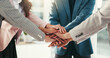 © peopleimages.com - Hands, huddle and team building with business people in office together for solidarity or unity. Collaboration, motivation and stack with employee group in workplace for celebration or success