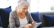 © peopleimages.com - House, tablet and old woman with credit card, payment and internet with online banking. Senior person, tech and elderly lady with purchase, debt and digital app for ecommerce, connection and mortgage