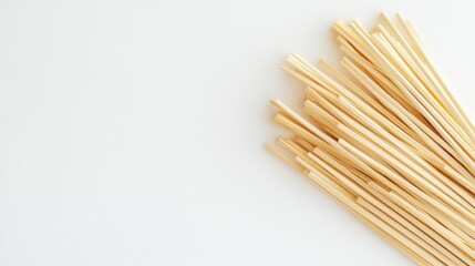Wall Mural - eco-friendly straw packing material arranged on white background for sustainable packaging solutions