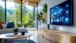© Phirakhup - Modern living room with smart TV and a view of nature through large windows.
