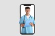 © Pixel-Shot - Young male doctor with clipboard looking out of smartphone screen on light background