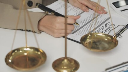 Wall Mural - justice and law concept.Male judge in a courtroom on wooden table and Counselor or Male lawyer working in office. Legal law, advice and justice concept.