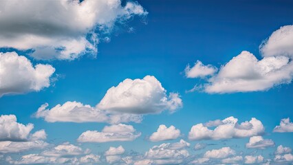 Poster - Fluffy white clouds scattered across a vibrant blue sky highlighting the beauty of nature and atmospheric tranquility in a serene composition.