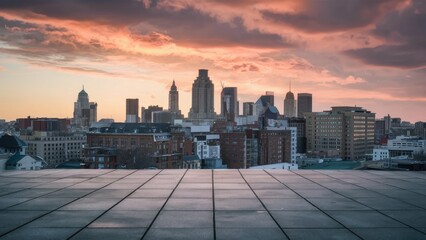 Aufkleber - Vacant square floor area with polished tiles in the foreground against a dramatic city skyline at sunset featuring various tall buildings