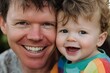 © felix_brönnimann - Father and child smiling together outdoors in a playful moment. Bonding, family happiness, and joyful expressions captured in a natural setting.