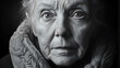 © Sarvana - Concerned elderly woman with a slight frown and thoughtful expression