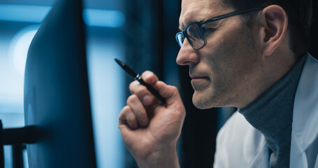 Aufkleber - Physician Examines Brain Scans on Computer Screen, Focusing on Healthcare Science and Medicine. Glasses Reflect Medical Images and Neurological Data. Close-up Portrait
