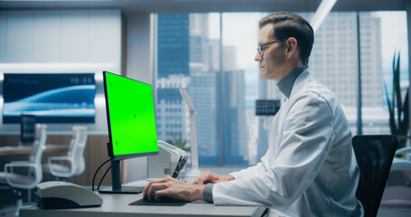 Aufkleber - Male Scientist in a White Lab Coat Works on a Green Screen Computer in a Modern Medical Lab, Focusing on Research and Healthcare Analysis in a High-tech Hospital Environment