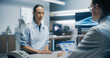 © Gorodenkoff - Female Patient Consults With a Male Specialist in a High-tech Medical Lab, Discussing Health Data on a Tablet. the Modern Hospital Environment Emphasizes Advanced Healthcare and Precise Analysis