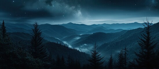 Wall Mural - Majestic nighttime Smoky Mountains panorama with deep blue hues, silhouettes of evergreen trees in foreground, and a tranquil starry sky backdrop.