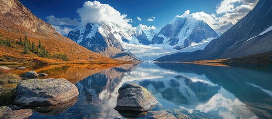 Wall Mural - Majestic mountain landscape with towering glaciers and serene lake reflections; vibrant blue skies, rocky foreground, and lush tundra scenery.