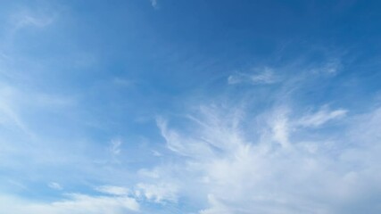 Wall Mural - beautiful blue sky with soft white clouds timelapse for abstract background