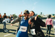 © Jacob Lund - Joyful female friends smiling before a half marathon race