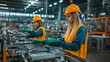 © zhou yan - Focused female factory workers assembling electronic components in a brightly lit industrial plant. Women in safety vests, gloves, and hard hats working with precision on circuit boards in a busy manu