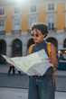 © bernardbodo - Young tourist reading a map in lisbon, portugal, during a sunny day