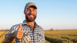 © PRASANNAPIX - young handsome man showing thumbs up in agricultural field