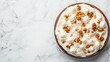 © donchanu - Delicious Creamy Dessert with Walnuts Whipped Topping Overhead Shot